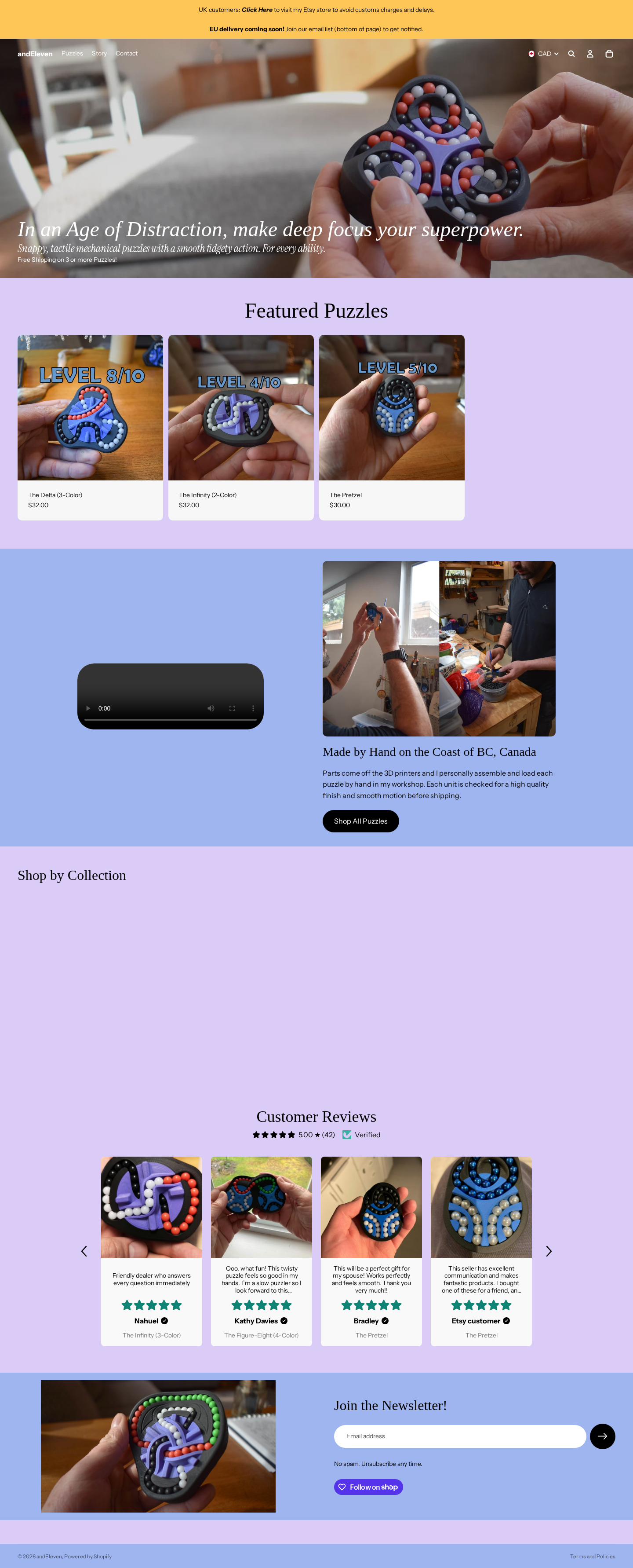 andEleven homepage — lavender background with hero puzzle imagery